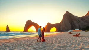 Couple enjoying Cabo Travel & Tourism sunset on a beach with iconic rock formations.