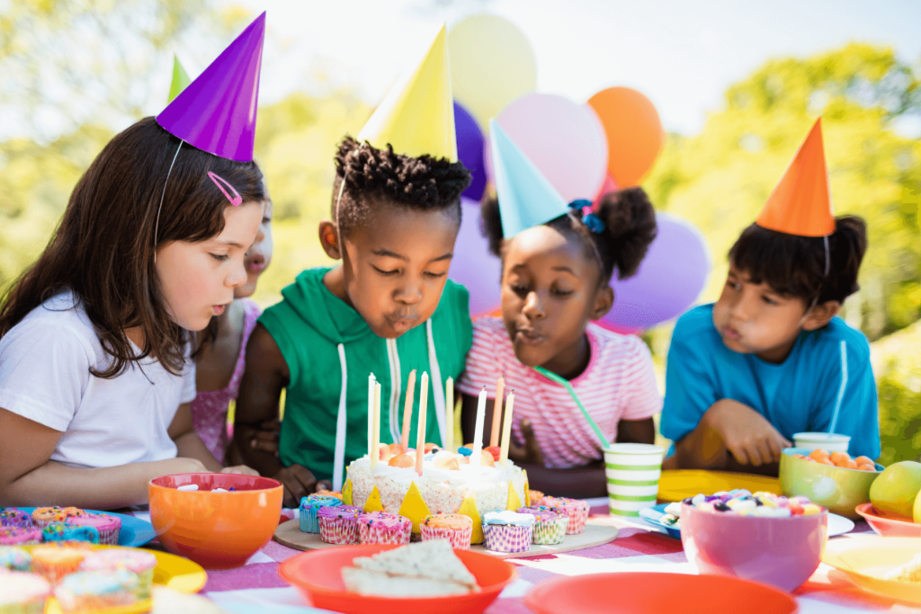 01_Blog_KidsBirthdayPartyIdeas_ChildrenBlowingOutCandles