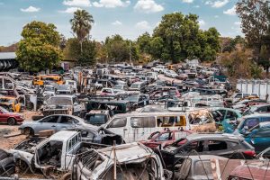 assorted-cars-parked-near-trees-2035016-scaled